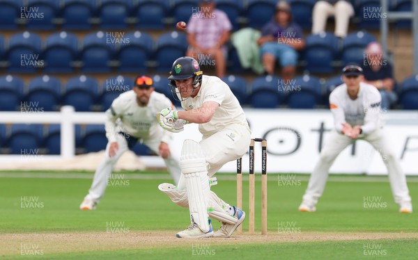 300826 Glamorgan v Hampshire, Rothesay County Championship Division 1 - Colin Ingram of Glamorgan takes action to avoid the ball