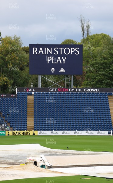 300826 Glamorgan v Hampshire, Rothesay County Championship Division 1 - Rain Stops Play graphics on the scoreboard at Sophia Gardens after play is interrupted