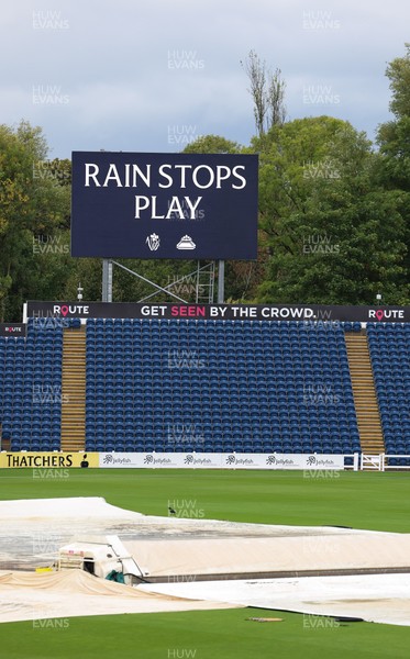 300826 Glamorgan v Hampshire, Rothesay County Championship Division 1 - Rain Stops Play graphics on the scoreboard at Sophia Gardens after play is interrupted