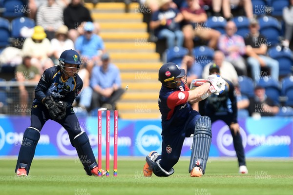 060725 - Glamorgan v Kent - T20, Vitality Blast - Sam Billings of Kent is bowled out by Andy Gorvin of Glamorgan