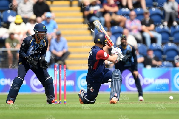 060725 - Glamorgan v Kent - T20, Vitality Blast - Sam Billings of Kent is bowled out by Andy Gorvin of Glamorgan