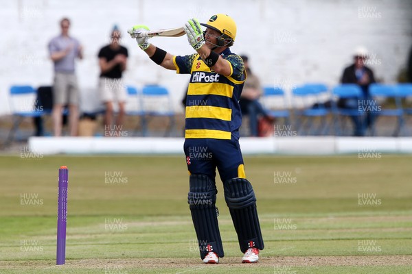 140517 - Glamorgan v Kent - Royal London One-Day Cup - Colin Ingram of Glamorgan raises his bat to team mates after scoring a century