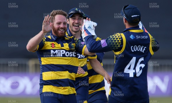 140517 - Glamorgan v Kent - Royal London One-Day Cup - David Lloyd of Glamorgan with team mates celebrates as Joe Denly is caught by Chris Cooke