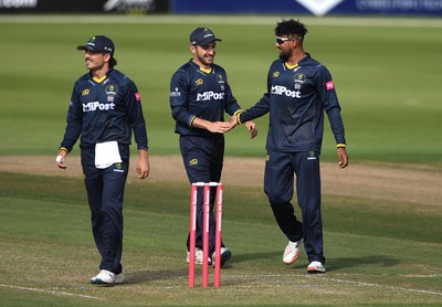 160621 - Glamorgan v Kent - T20 Vitality Blast - Prim Sisodiya of Glamorgan celebrates the wicket of Zak Crawley of Kent with Andrew Salter