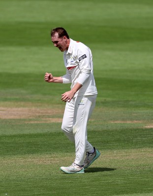 220725 - Glamorgan v Kent - Rothesay County Championship Division 2 - Ben Kellaway of Glamorgan celebrates taking the wicket of Chris Benjamin for LBW