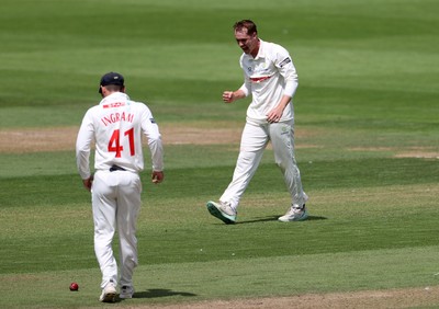 220725 - Glamorgan v Kent - Rothesay County Championship Division 2 - Ben Kellaway of Glamorgan celebrates taking the wicket of Chris Benjamin for LBW