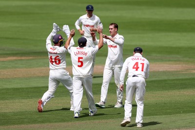 220725 - Glamorgan v Kent - Rothesay County Championship Division 2 - Ben Kellaway of Glamorgan celebrates taking the wicket of Chris Benjamin for LBW