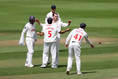 220725 - Glamorgan v Kent - Rothesay County Championship Division 2 - Ben Kellaway of Glamorgan celebrates taking the wicket of Chris Benjamin for LBW