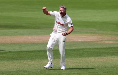 220725 - Glamorgan v Kent - Rothesay County Championship Division 2 - Timm Van Der Gugten of Glamorgan celebrates after Joey Evison is caught by Chris Cooke
