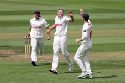 220725 - Glamorgan v Kent - Rothesay County Championship Division 2 - Timm Van Der Gugten of Glamorgan celebrates after Joey Evison is caught by Chris Cooke