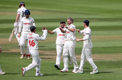 220725 - Glamorgan v Kent - Rothesay County Championship Division 2 - Timm Van Der Gugten of Glamorgan celebrates after Joey Evison is caught by Chris Cooke