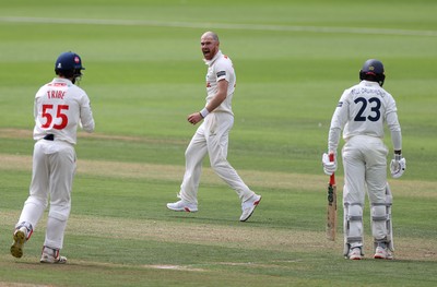 220725 - Glamorgan v Kent - Rothesay County Championship Division 2 - James Harris of Glamorgan celebrates taking the wicket of Daniel Bell-Drummond for LBW