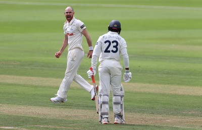 220725 - Glamorgan v Kent - Rothesay County Championship Division 2 - James Harris of Glamorgan celebrates taking the wicket of Daniel Bell-Drummond for LBW