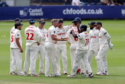 220725 - Glamorgan v Kent - Rothesay County Championship Division 2 - Timm Van Der Gugten of Glamorgan celebrates with team mates after taking the wicket of Matt Parkinson