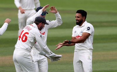 220725 - Glamorgan v Kent - Rothesay County Championship Division 2 - Zain ul Hassan of Glamorgan celebrates taking the wicket of Wes Agar for LBW