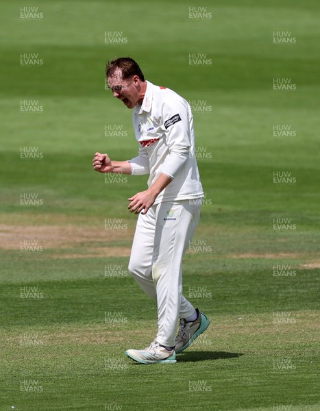 220725 - Glamorgan v Kent - Rothesay County Championship Division 2 - Ben Kellaway of Glamorgan celebrates taking the wicket of Chris Benjamin for LBW