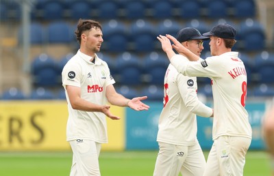 240725  Glamorgan v Kent, Rothesay County Championship Division 2, Day 3 - Ned Leonard of Glamorgan celebrates as he takes the wicket of Daniel Bell-Drummond of Kent