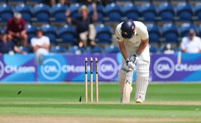 240725  Glamorgan v Kent, Rothesay County Championship Division 2, Day 3 - Chris Benjamin of Kent is bowled out by James Harris of Glamorgan