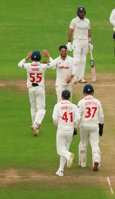 240725  Glamorgan v Kent, Rothesay County Championship Division 2, Day 3 - Kiran Carlson of Glamorgan is congratulated after he catches Harry Finch of Kent off his own bowling