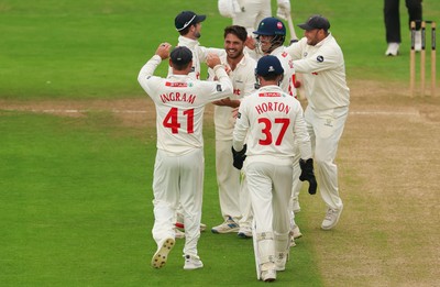 240725  Glamorgan v Kent, Rothesay County Championship Division 2, Day 3 - Kiran Carlson of Glamorgan is congratulated after he catches Harry Finch of Kent off his own bowling