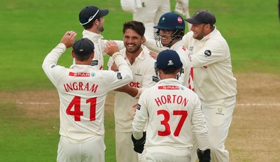 240725  Glamorgan v Kent, Rothesay County Championship Division 2, Day 3 - Kiran Carlson of Glamorgan is congratulated after he catches Harry Finch of Kent off his own bowling