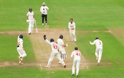 240725  Glamorgan v Kent, Rothesay County Championship Division 2, Day 3 - Kiran Carlson of Glamorgan and Billy Root of Glamorgan celebrate as they combine to dismiss Matt Quinn of Kent