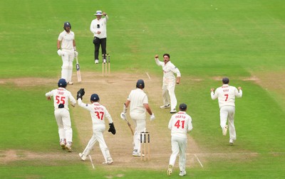240725  Glamorgan v Kent, Rothesay County Championship Division 2, Day 3 - Kiran Carlson of Glamorgan and Billy Root of Glamorgan celebrate as they combine to dismiss Matt Quinn of Kent