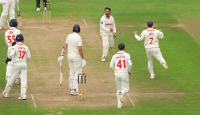 240725  Glamorgan v Kent, Rothesay County Championship Division 2, Day 3 - Kiran Carlson of Glamorgan and Billy Root of Glamorgan celebrate as they combine to dismiss Matt Quinn of Kent
