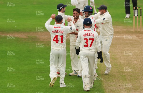 240725  Glamorgan v Kent, Rothesay County Championship Division 2, Day 3 - Kiran Carlson of Glamorgan is congratulated after he catches Harry Finch of Kent off his own bowling