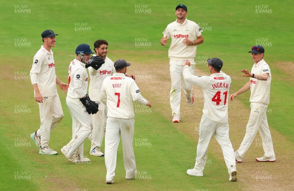 240725  Glamorgan v Kent, Rothesay County Championship Division 2, Day 3 - Kiran Carlson of Glamorgan is congratulated as he takes the wicket of Wes Agar of Kent