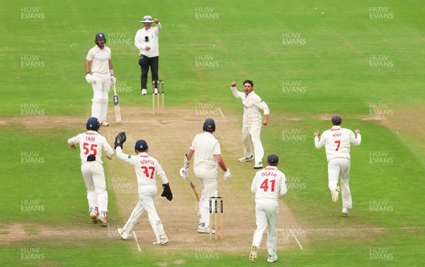 240725  Glamorgan v Kent, Rothesay County Championship Division 2, Day 3 - Kiran Carlson of Glamorgan and Billy Root of Glamorgan celebrate as they combine to dismiss Matt Quinn of Kent