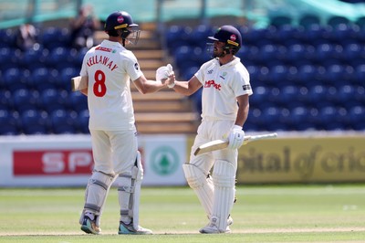 250725 - Glamorgan v Kent - Rothesay County Championship Division 2 - Ben Kellaway and Kiran Carlson of Glamorgan celebrate at the end of the match