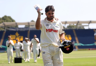 250725 - Glamorgan v Kent - Rothesay County Championship Division 2 - Kiran Carlson of Glamorgan celebrates at the end of the match