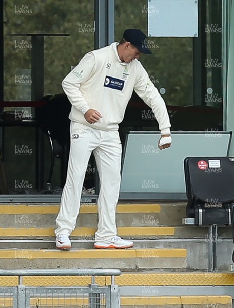 290421 Glamorgan v Kent, LV= County Championship, Group Three - Marnus Labuschagne of Glamorgan with his hand strapped after being assessed for an injury