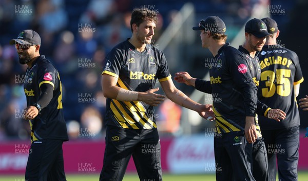 020623 - Glamorgan v Kent Spitfires, Vitality Blast T20 - Peter Hatzoglou of Glamorgan is congratulated after he takes the wicket of Jordan Cox of Kent Spitfires