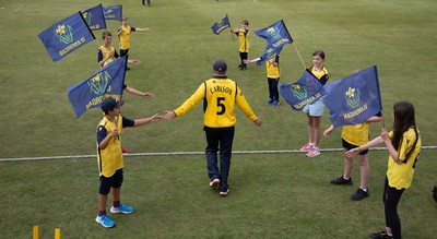 170822 - Glamorgan v Lancashire, Royal London One Day Cup - Kiran Carlson of Glamorgan leads the team out through the guard of honour at Neath