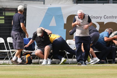 170822 - Glamorgan v Lancashire, Royal London One Day Cup - Tom Cullen of Glamorgan crashes into spectators as he attempts to catch a ball heading for a six