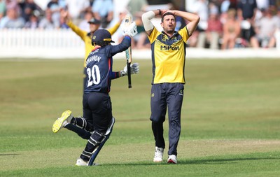 170822 - Glamorgan v Lancashire, Royal London One Day Cup - Ruaidhri Smith of Glamorgan  reacts after bowling