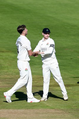 240925 - Glamorgan v Lancashire - Rothesay County Championship - Asa Tribe of Glamorgan is caught out by Matty Hurst of Lancashire from the bowling of Jack Blatherwick of Lancashire