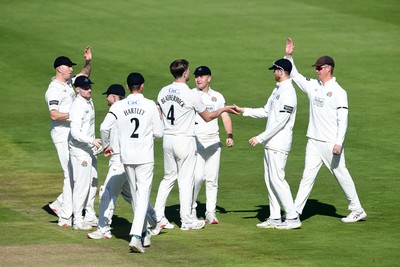 240925 - Glamorgan v Lancashire - Rothesay County Championship - Asa Tribe of Glamorgan is caught out by Matty Hurst of Lancashire from the bowling of Jack Blatherwick of Lancashire