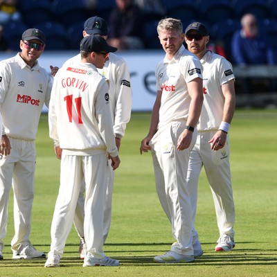 250925 - Glamorgan v Lancashire - Rothesay County Championship - Timm Van Der Gugten of Glamorgan celebrates with team mates after taking the wicket of Josh Bohannon of Lancashire