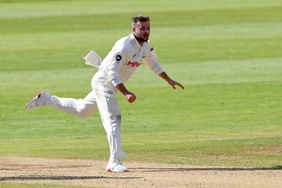 250925 - Glamorgan v Lancashire - Rothesay County Championship - Mason Crane of Glamorgan bowls the ball to dismiss Luke Wells of Lancashire who is LBW