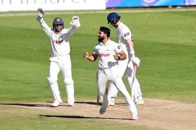 250925 - Glamorgan v Lancashire - Rothesay County Championship - Zain Ul Hassan of Glamorgan celebrates with team mates after bowling out Michael Jones of Lancashire who was LBW