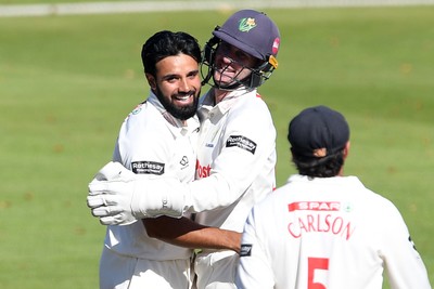 250925 - Glamorgan v Lancashire - Rothesay County Championship - Zain Ul Hassan of Glamorgan celebrates with team mates after bowling out Michael Jones of Lancashire who was LBW
