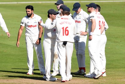 250925 - Glamorgan v Lancashire - Rothesay County Championship - Zain Ul Hassan of Glamorgan celebrates with team mates after bowling out Michael Jones of Lancashire who was LBW