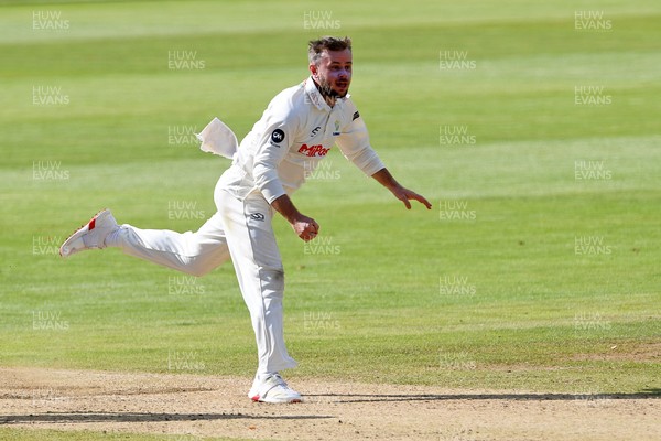 250925 - Glamorgan v Lancashire - Rothesay County Championship - Mason Crane of Glamorgan bowls the ball to dismiss Luke Wells of Lancashire who is LBW