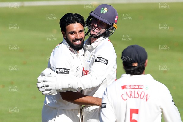 250925 - Glamorgan v Lancashire - Rothesay County Championship - Zain Ul Hassan of Glamorgan celebrates with team mates after bowling out Michael Jones of Lancashire who was LBW