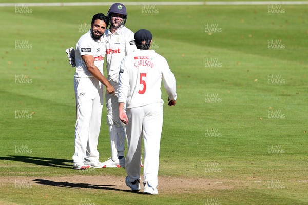 250925 - Glamorgan v Lancashire - Rothesay County Championship - Zain Ul Hassan of Glamorgan celebrates with team mates after bowling out Michael Jones of Lancashire who was LBW