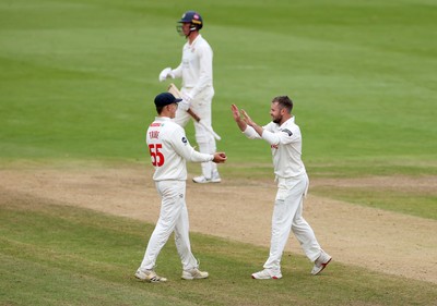 260925 - Glamorgan v Lancashire, Rothesay County Championship - Mason Crane of Glamorgan celebrates with Asa Tribe and dismissing Keaton Jennings
