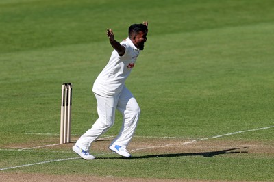 050425 - Glamorgan v Leicestershire - Rothesay County Championship Division 2 - Asitha Fernando of Glamorgan celebrates taking the wicket of Ben Mike of Leicestershire